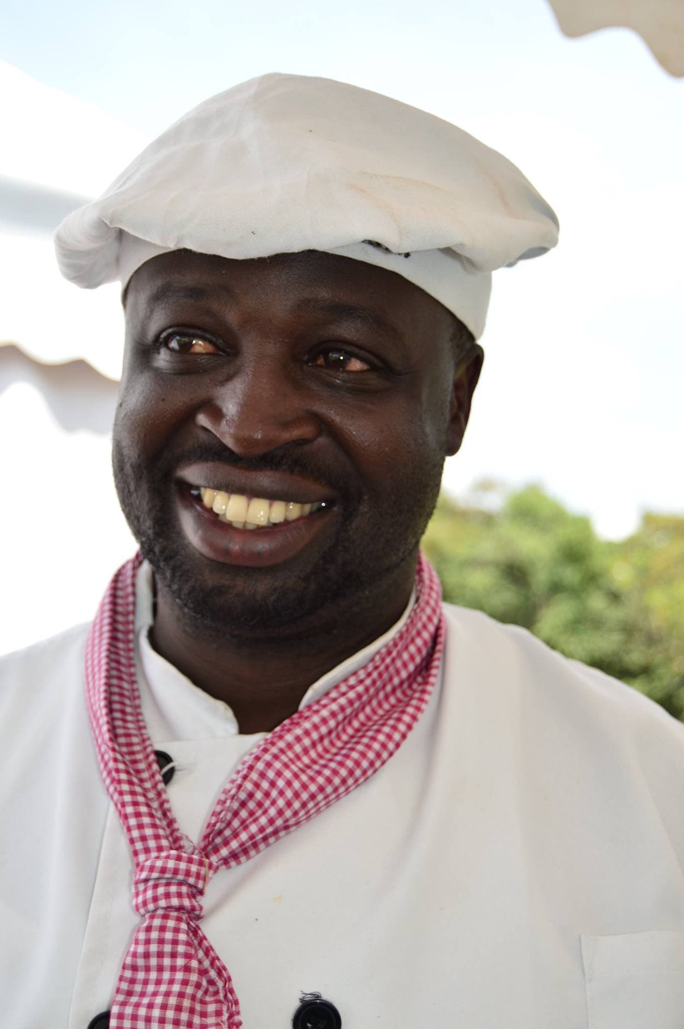 A smiling Afritouch chef